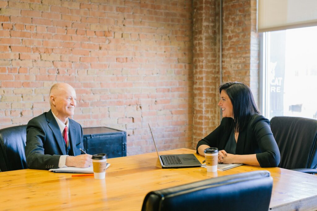 Attorney meeting with a client in an office